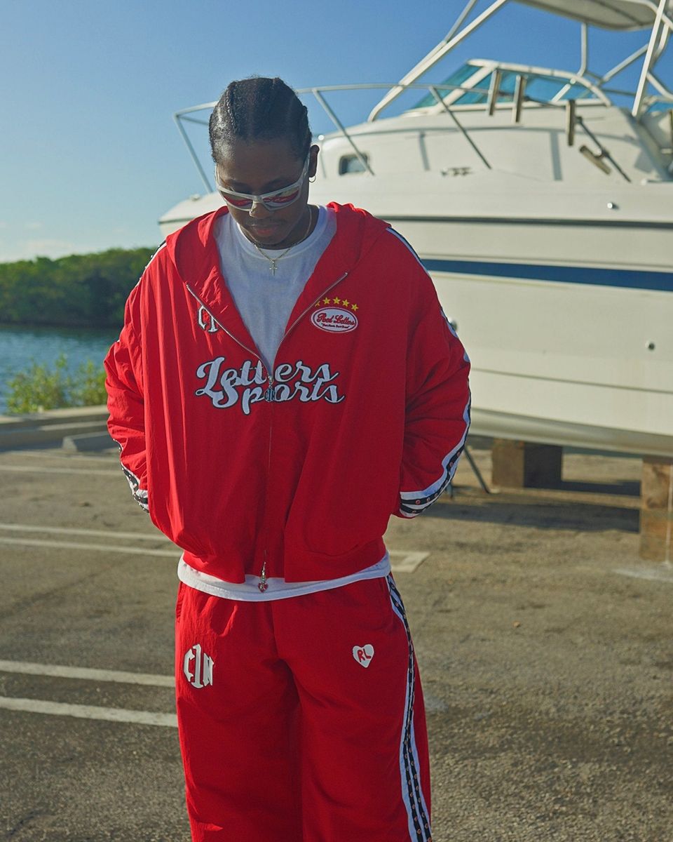 red letters “c1n” zip up